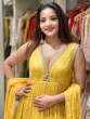 monalisa in yellow anarkali suit at event